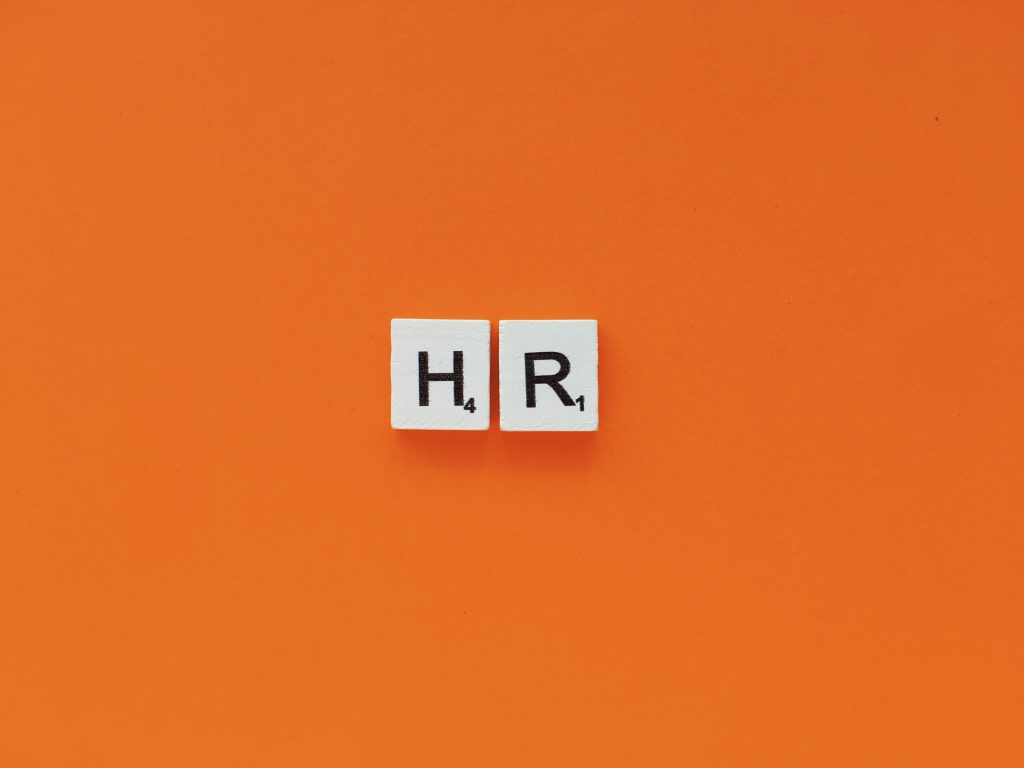 HR Scrabble Letters on Orange Background